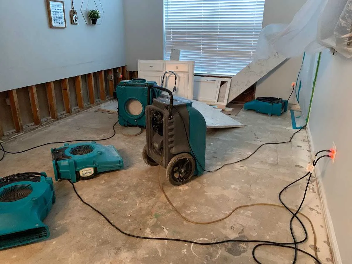 Dehumidifier in flood-cut room for Water Damage Restoration in Lincoln Park